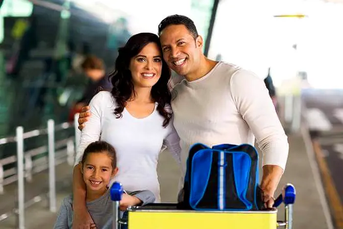 Family travelling with luggage