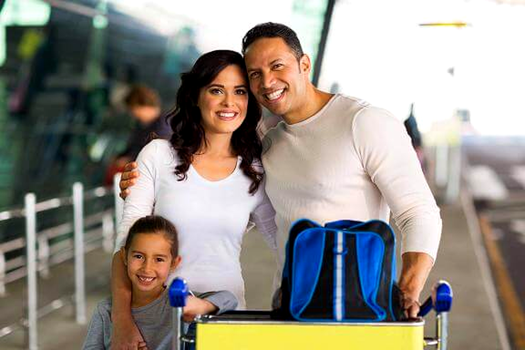 Family travelling with luggage
